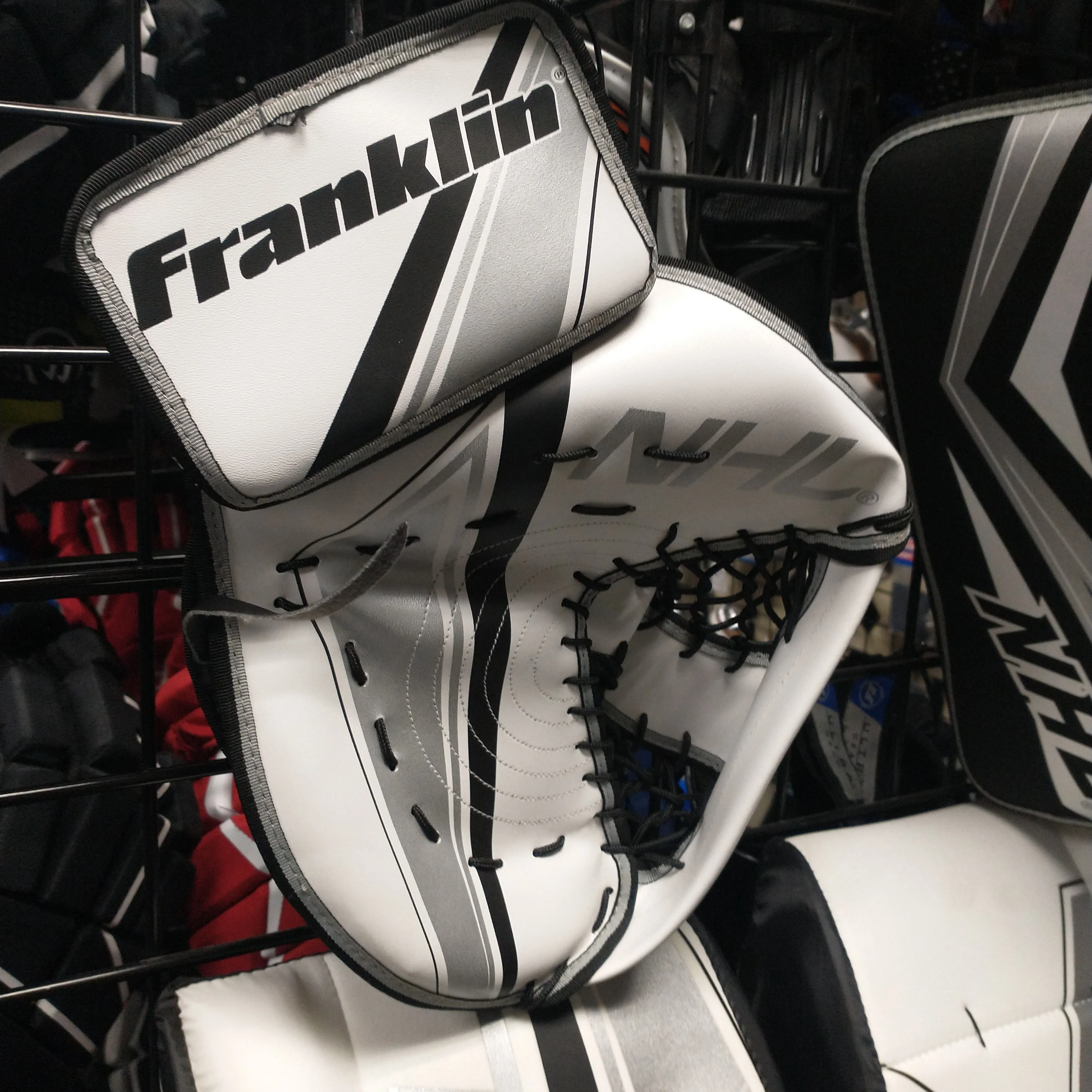 Franklin Sports NHL Kids Street Hockey Goalie Pads Set Kids Hockey Training Equipment Block Pad, Catch Glove, and Goalie Pads